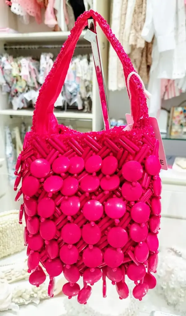 ICONIQUE - BORSA CON BORCHIE COLORATE